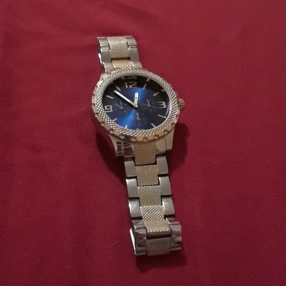 Gold and silver watch.